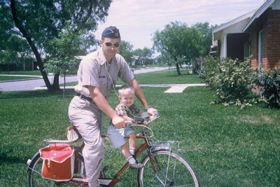 Vintage photo of young Ron Paul and son emerges