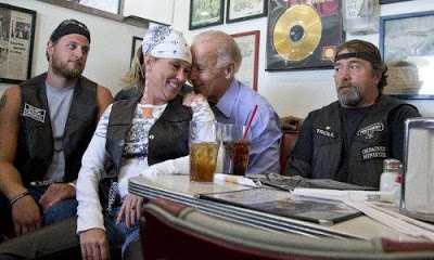 Funny photo — Biden flirts with biker-chick