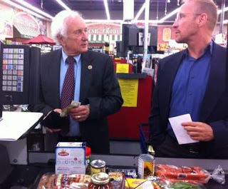Caption this pic of Sandy Levin and David Coulter at the supermarket checkout