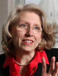 Peters backed by cops; Land lays low