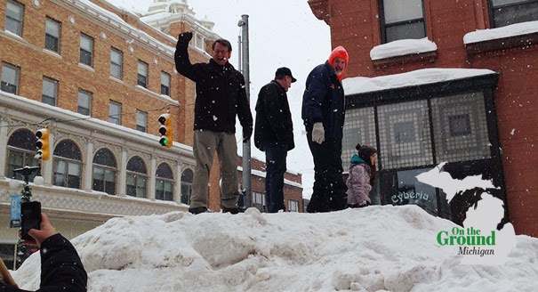 Peters engages in whiskey and dog-sledding; Land dodges questions