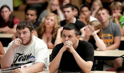 Education officials put a happy face on grim test results