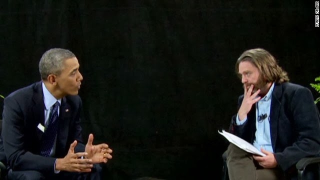 Obama video interview compared to Bush’s 2004 slideshow