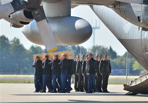 Salute to Malaysian airline victims creates pride and pain among Mich. Dutch