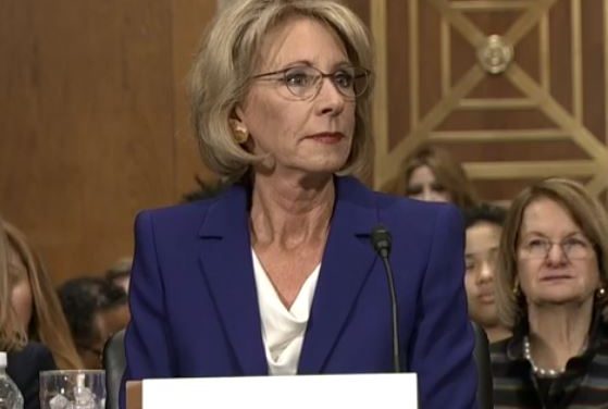 Dark money boosting DeVos confirmation