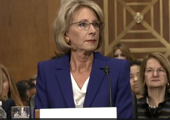 Dark money boosting DeVos confirmation