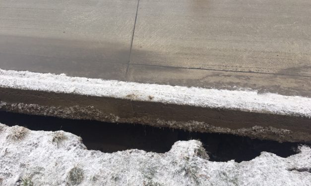 Gap under road found by the Fraser sinkhole site